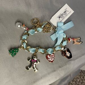 NWT Betsey Johnson Gold Bracelet with Blue Bow and Holiday Charms